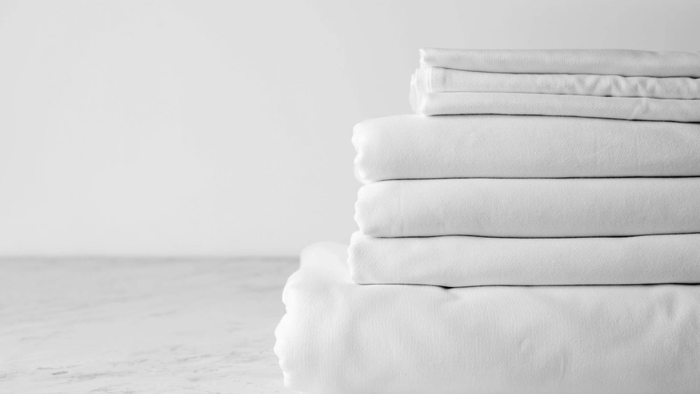 MongoDB logo with a laptop in the background.